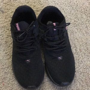 Black puma training shoes